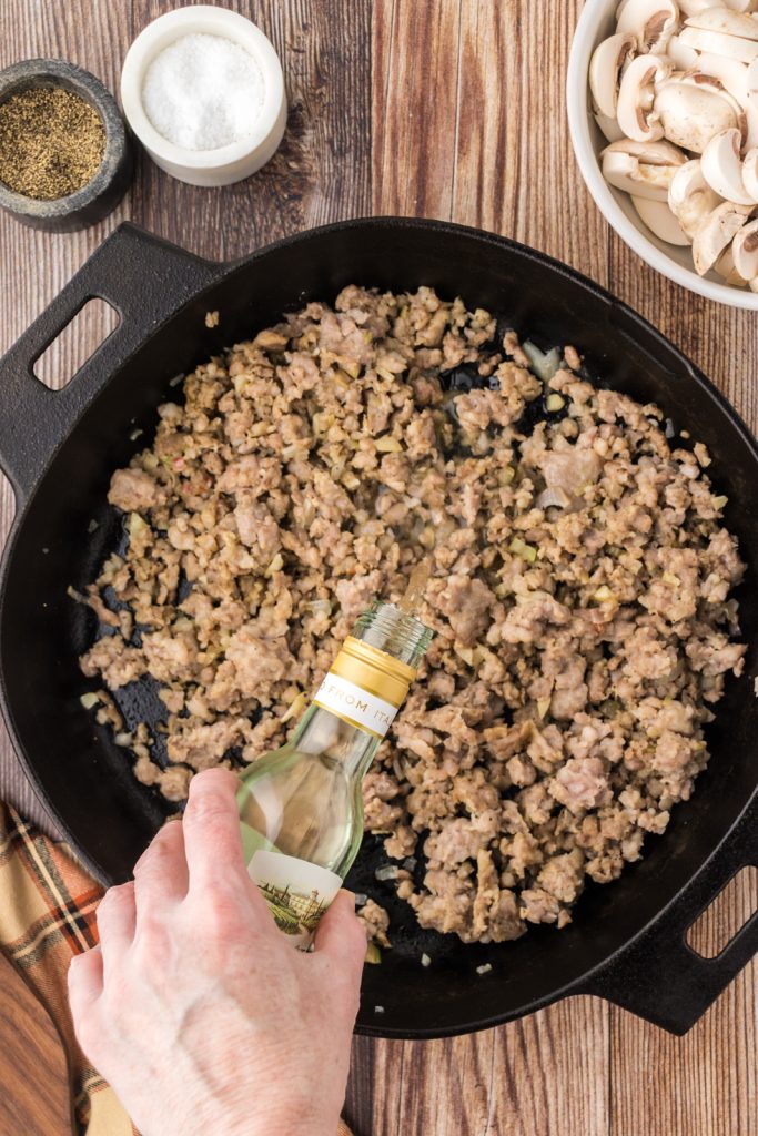 Deglazing the cast iron skillet with white wine or you can use chicken broth.