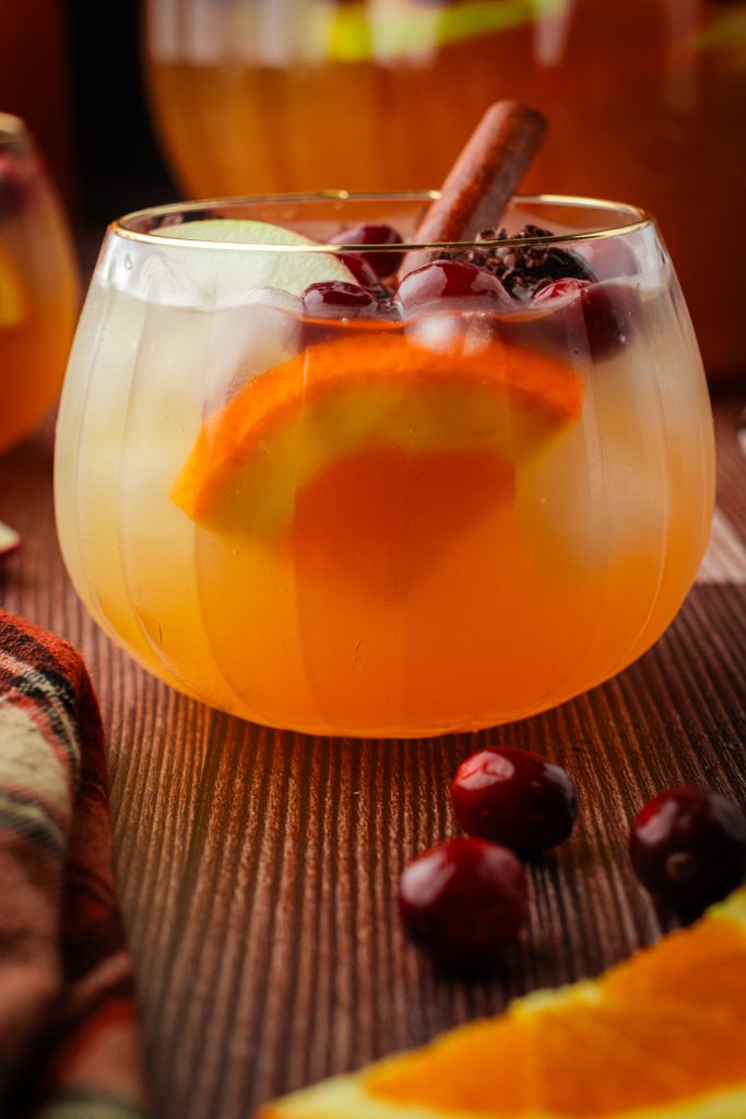 The perfect fall cocktail for cool autumn days with white wine, apple cider, orange liqueur, and brandy.