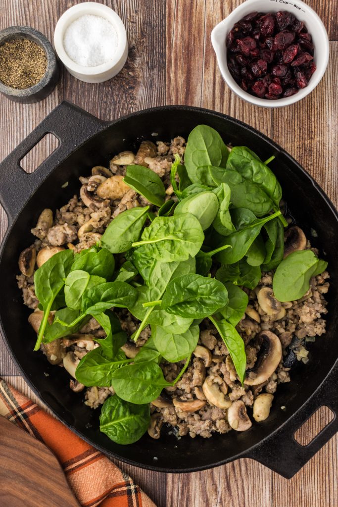 Fresh baby spinach in sausage stuffing for vitamins and nutrients.