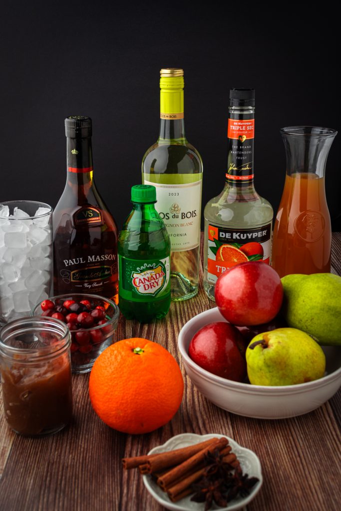 Dry white wine, sweet apple cider, brandy, triple sec, and seasonal fruit to make a fall sangria.