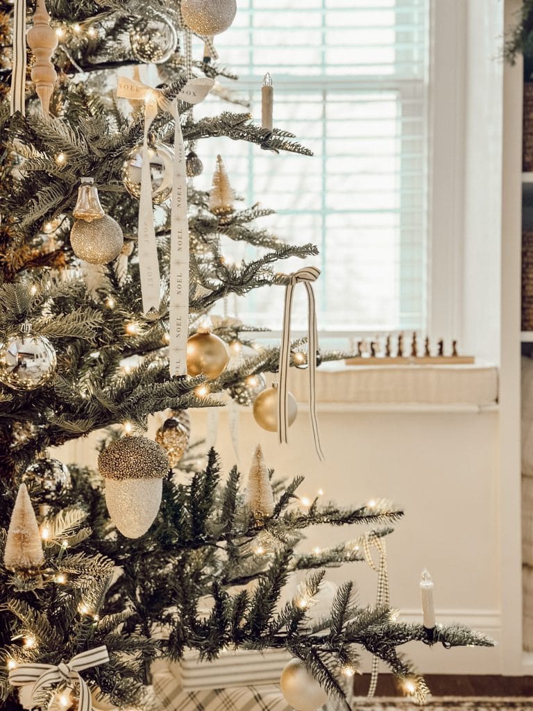 Simple ornaments on Christmas tree in the living room.