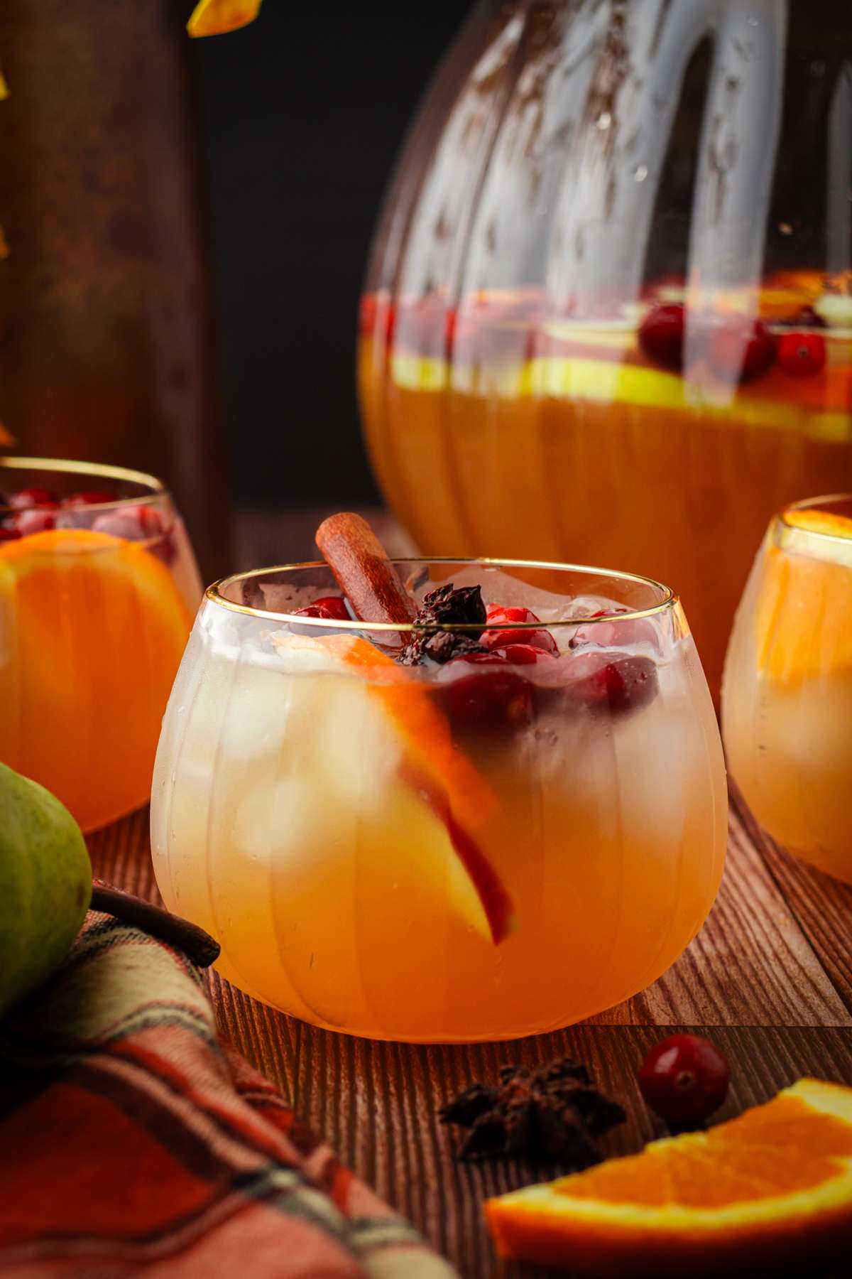 Perfect Thanksgiving cocktail for the holiday season with fresh fruit and cranberries.