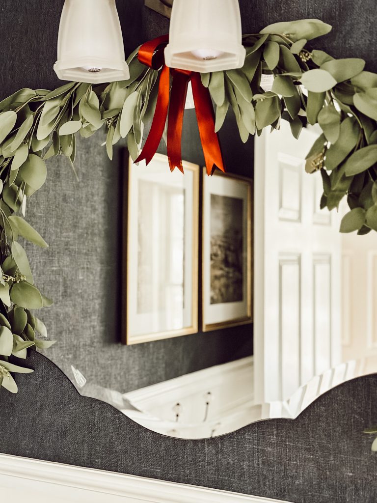 As the holiday season approaches add a garland to your bathroom mirror for festive cheer.