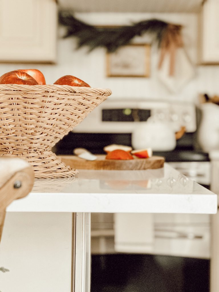 A bowl full of red apples is a great way to decorate for the holiday season with limited time to decorate.