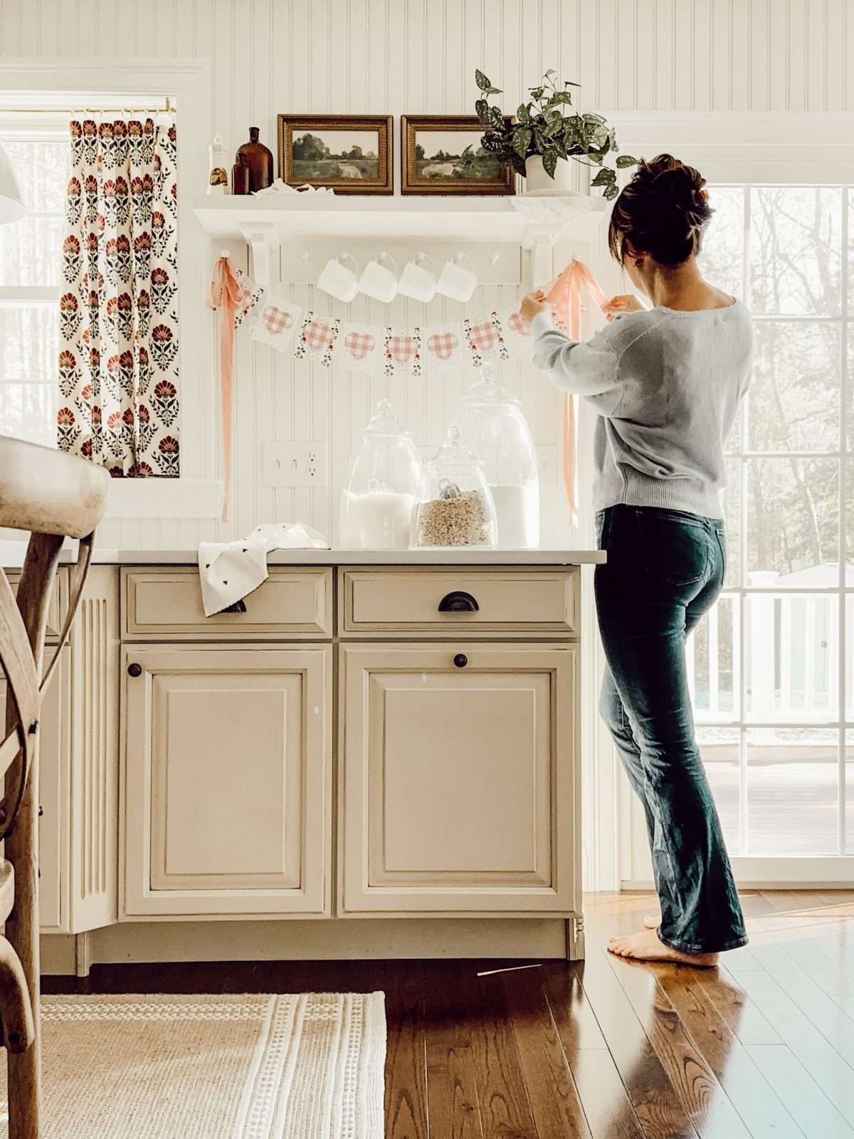 DIY heart garland for Valentine's Day in cozy cottage kitchen.