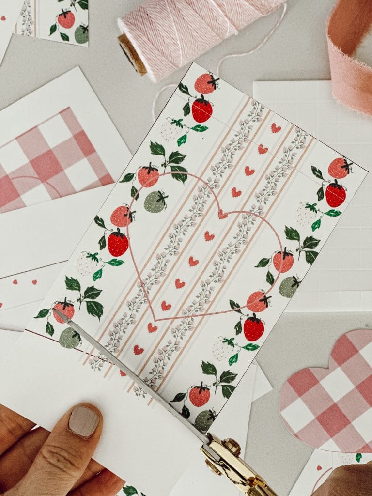 Cut out the pennant template with sharp scissors for the Valentine bunting.