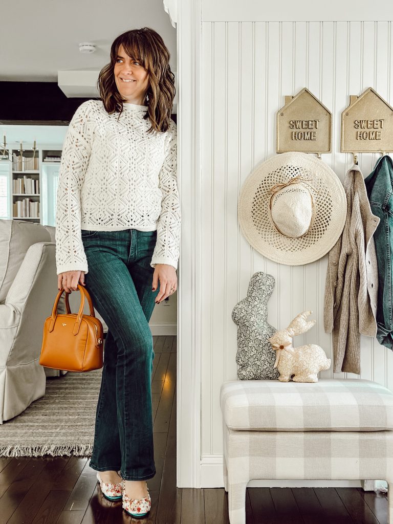 Cute, cozy, and comfortable shoes for spring and summer with dark jeans and a white sweater.