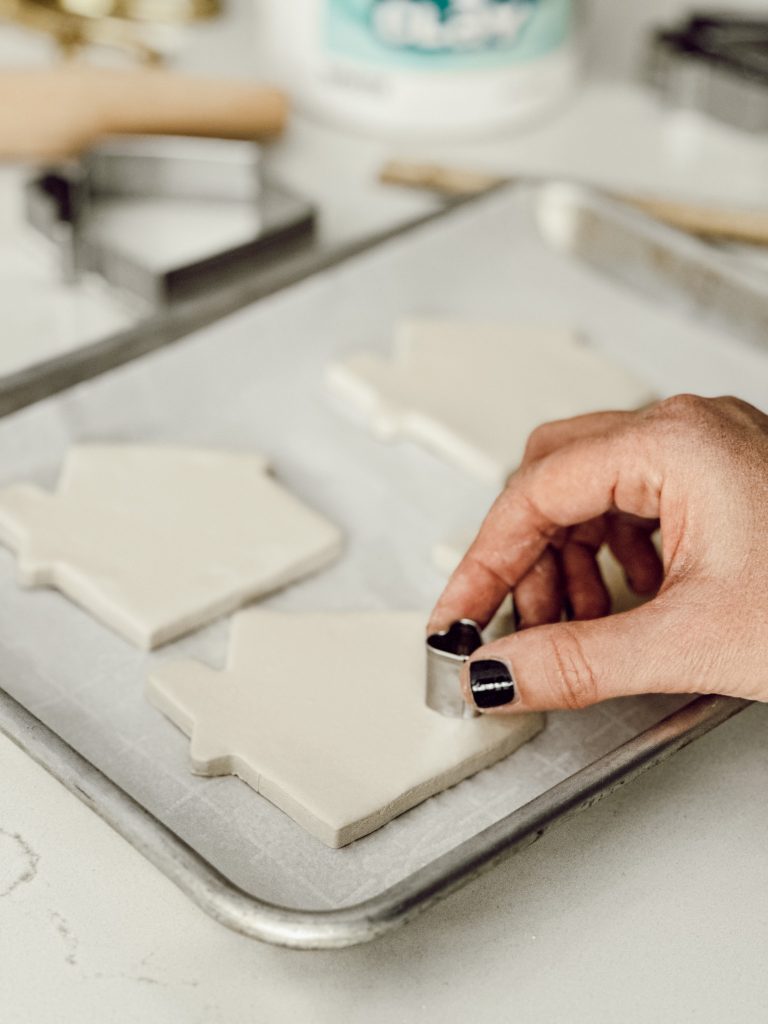 DIY coasters on parchment lined baking sheet for drying.