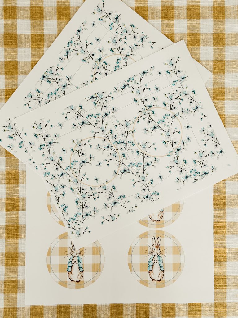Pieces of cardstock with the floral and rabbit designs to make the easy Easter garland.