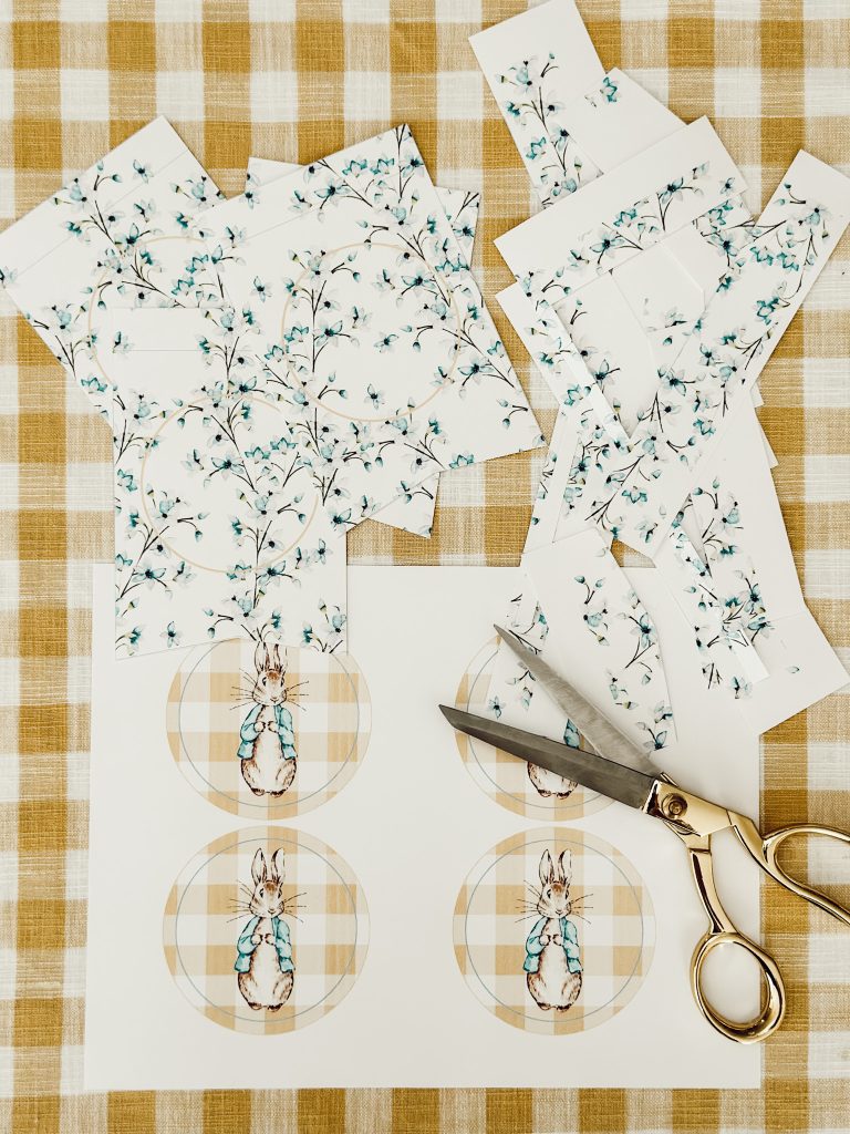 Paper pennants cut out of white cardstock for the Easter garland DIY.