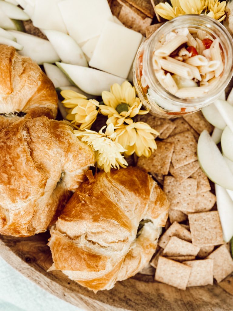 Chicken salad with avocado on croissant rolls for a lazy Sunday dinner.
