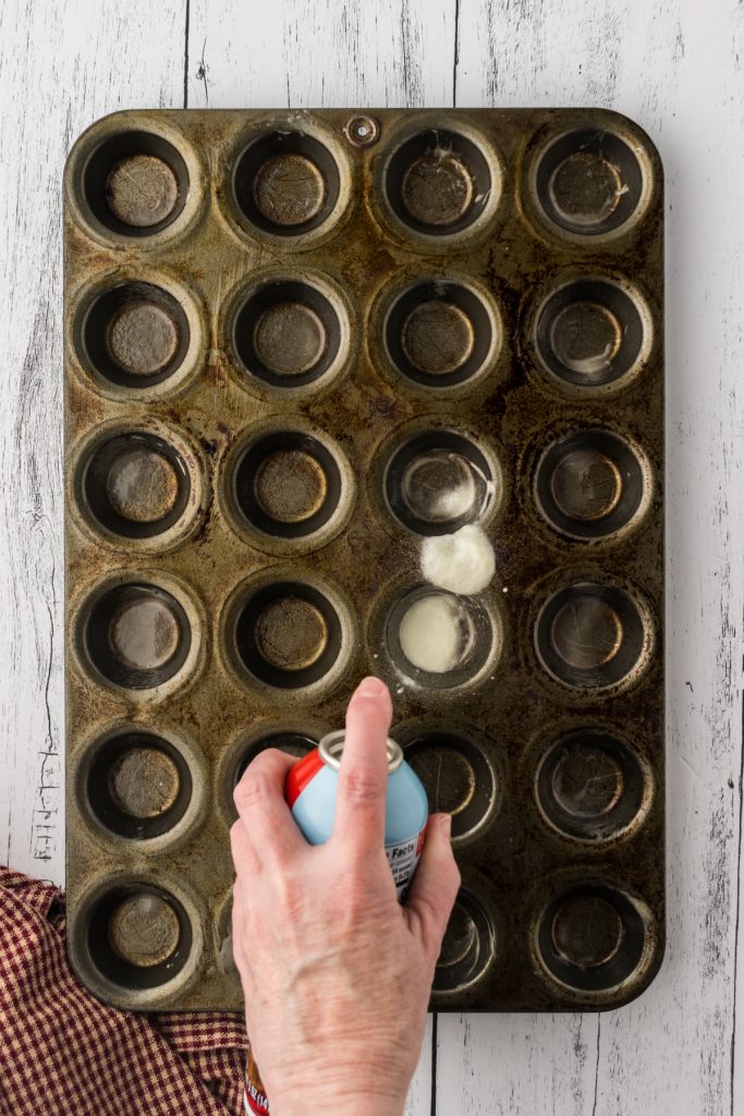 Mini muffin tin sprayed with non-stick cooking spray to prevent the pie crusts from sticking.
