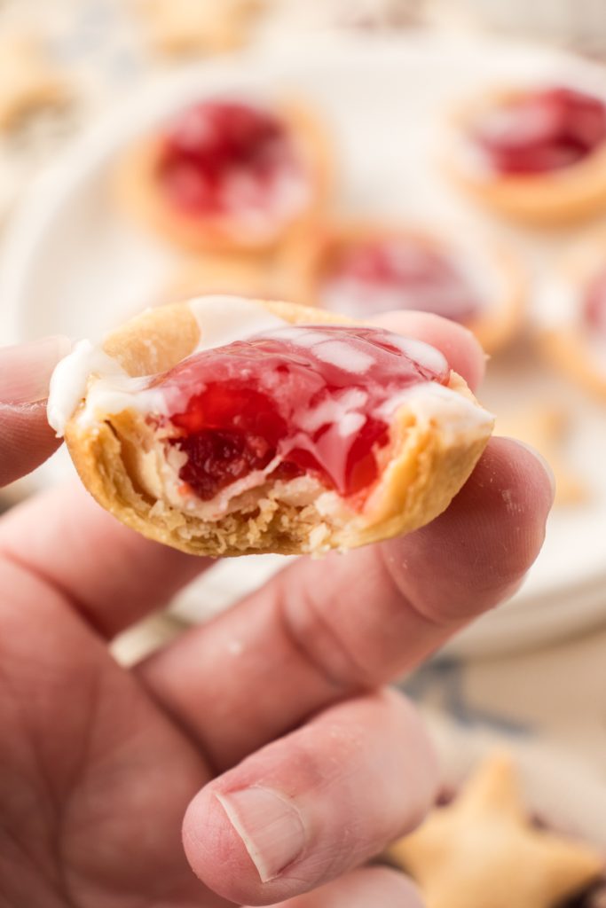 Mini homemade cherry recipe with canned cherries, store-bought pie crust, and powdered sugar glaze.