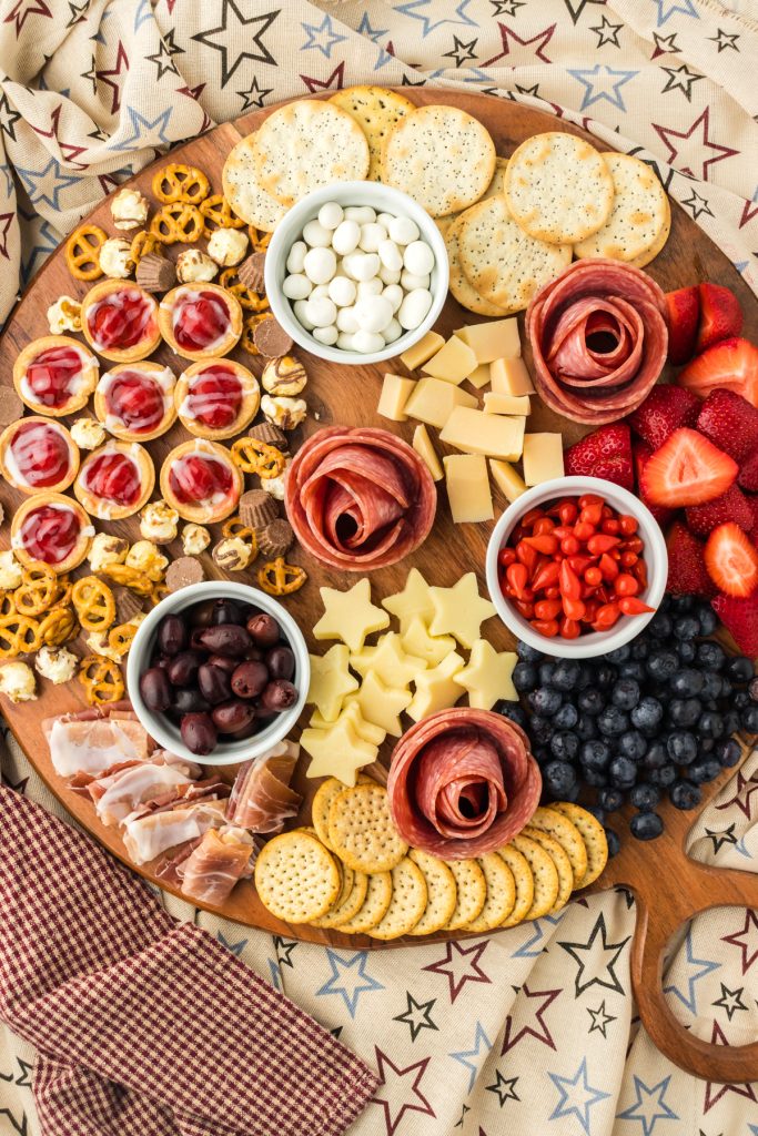Tuck in snack crackers for a savory bite on the grazing board.