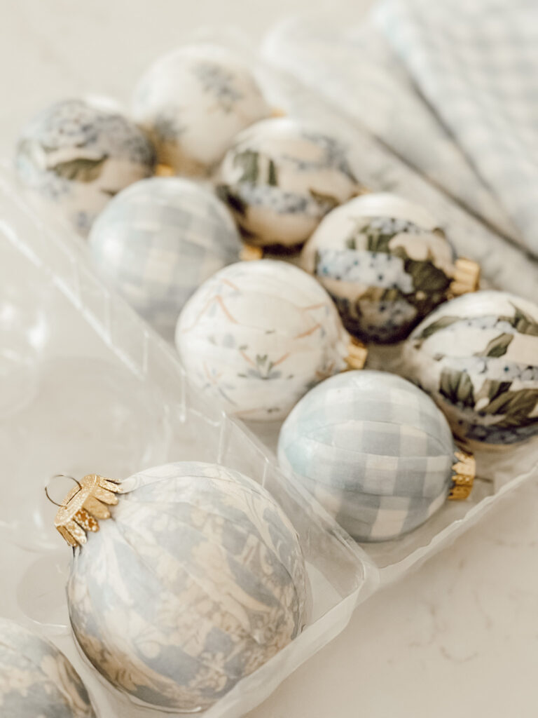 Christmas DIY ornaments made with fabric and Mod Podge waiting to be hung on the tree.