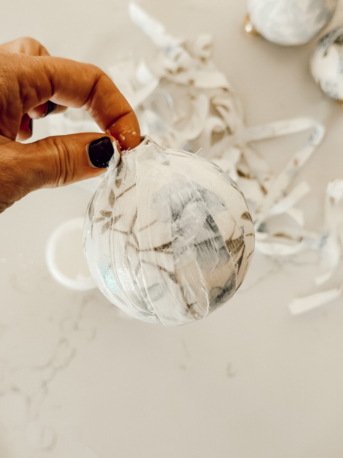 Handmade decoupage ornament for the Christmas tree to decorate for the holiday season.