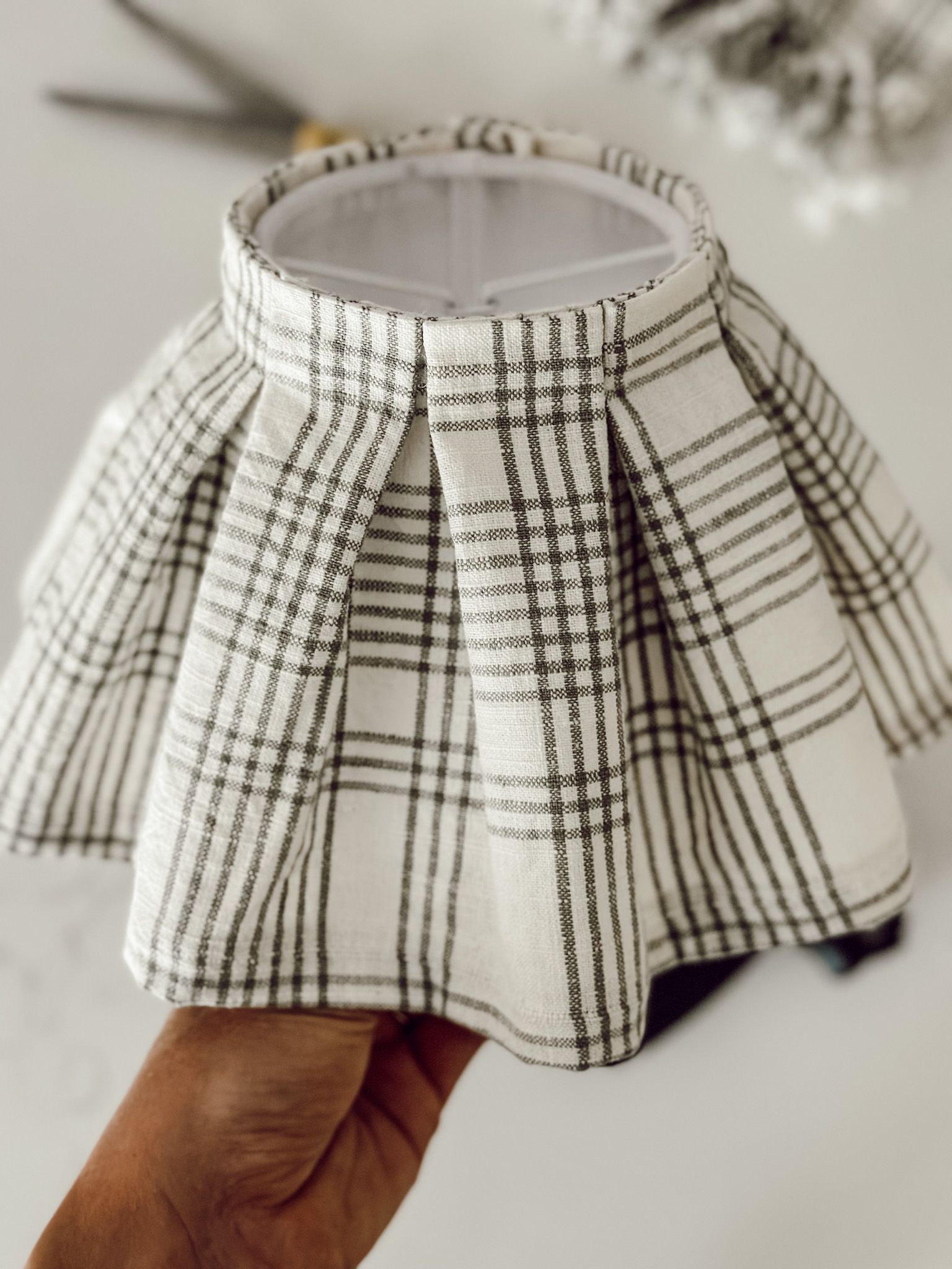 Finished lampshade cover ready for putting on a light for cozy ambiance.