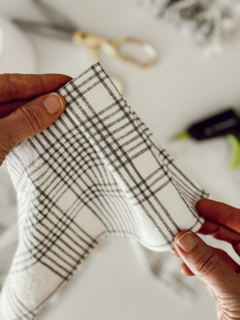 After hot gluing the first pleat together for the cover, this is how the pleat should look.