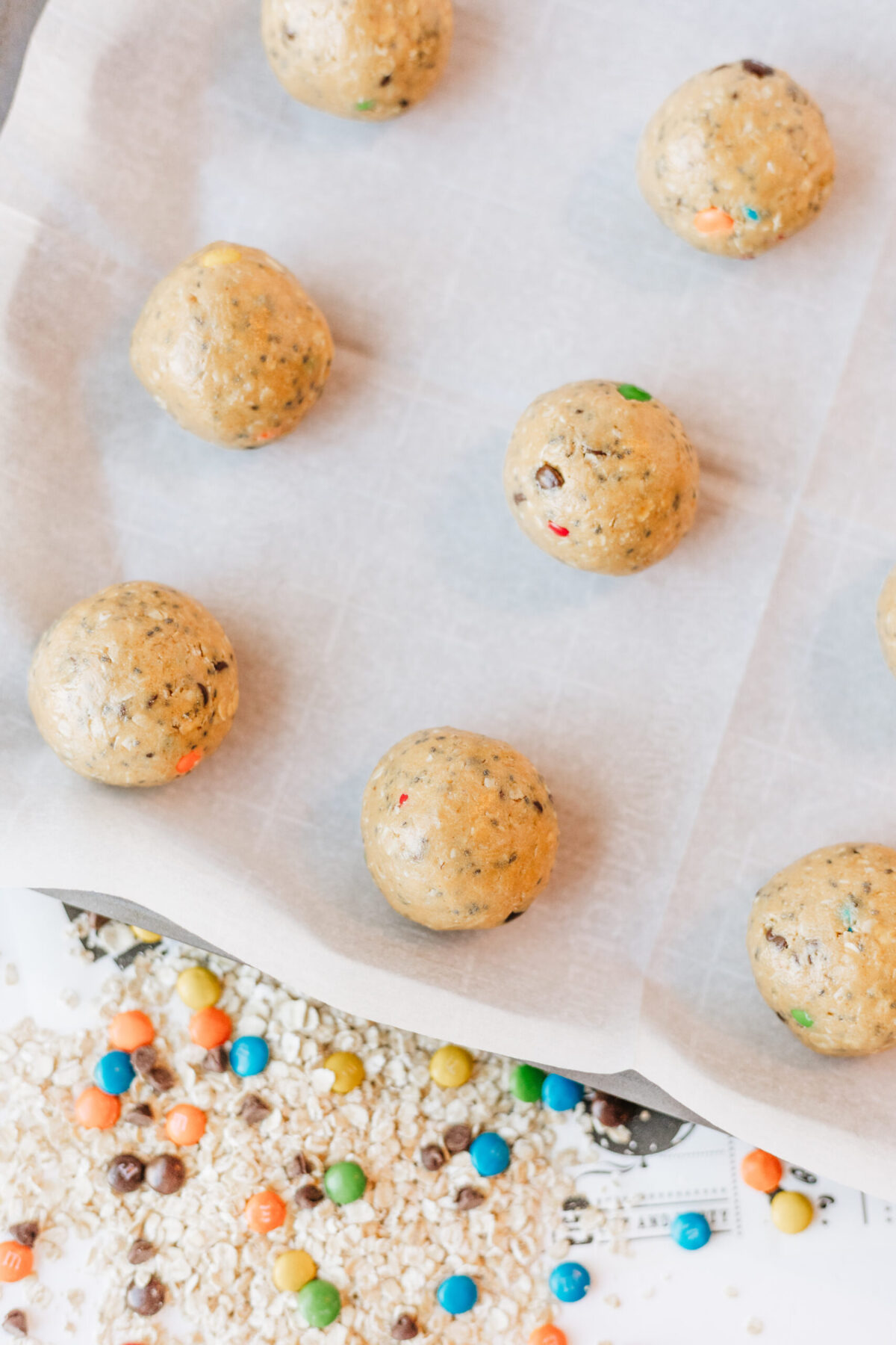 Add the monster cookie protein balls to the fridge to firm them up before eating.