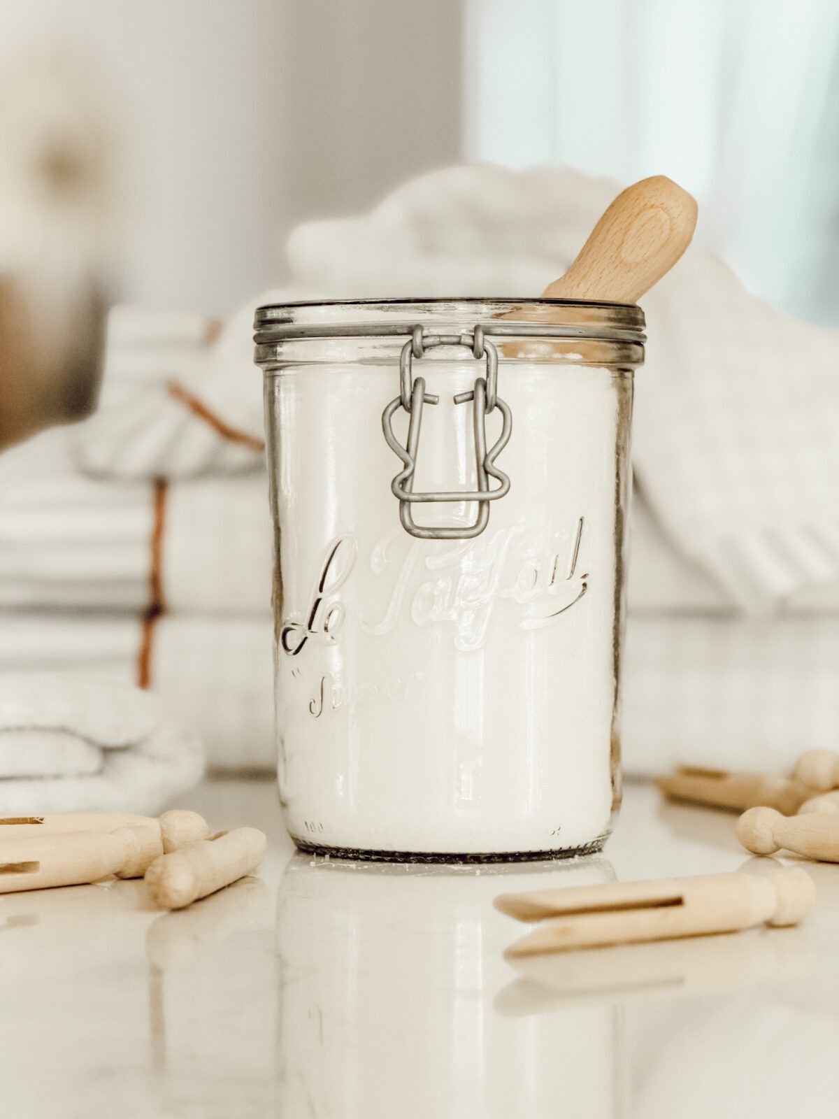 All-natural laundry scent booster DIY made with epsom salt, baking soda, and essential oils.
