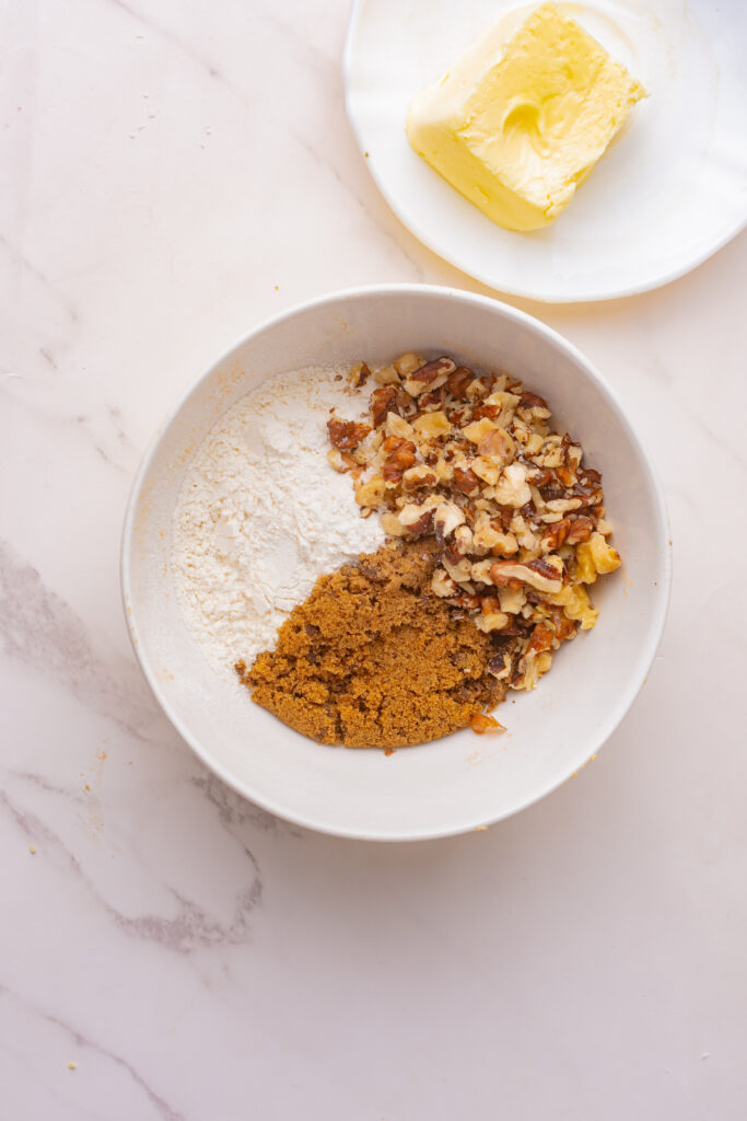 All-purpose flour, chopped walnuts, cinnamon, and softened butter to make a streusel topping.
