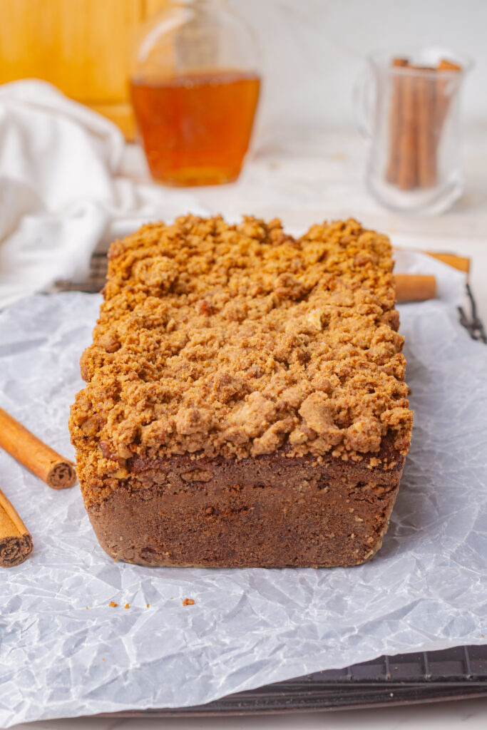 Coffee cake cooling on a wire rack on the kitchen counter.