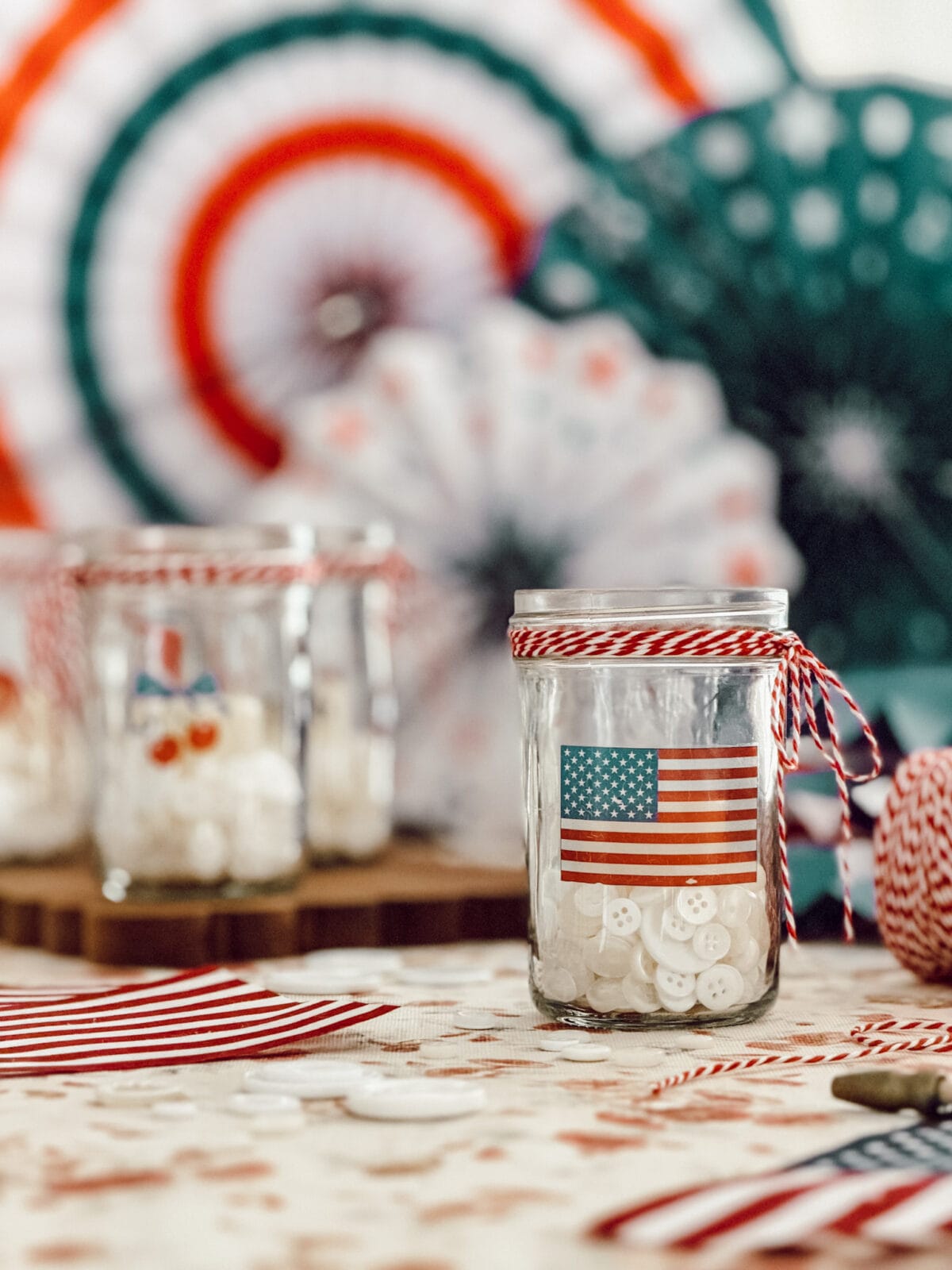 DIY Patriotic mason jar candle holders with temporary tattoos.