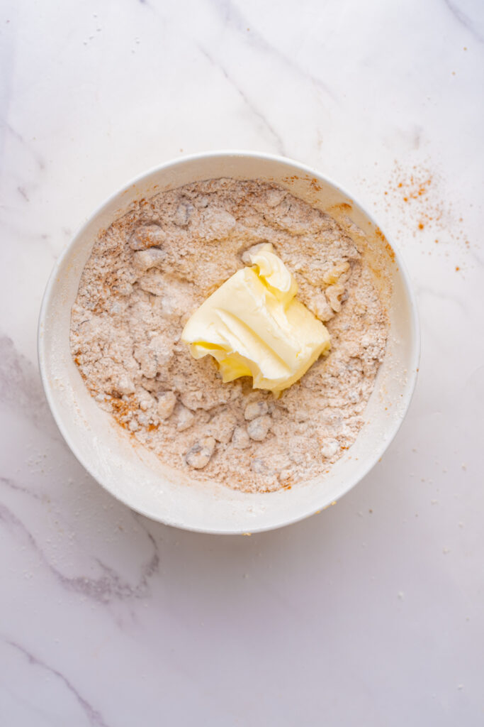 Maple walnut coffee cake struesel topping with flour, sugar, ground cinnamon, and butter.