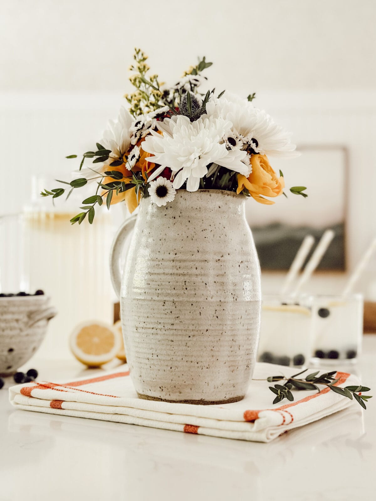 Weekly Wednesday wish list #258 Eleanor Rose Home summer flowers with a pitcher of lemonade.
