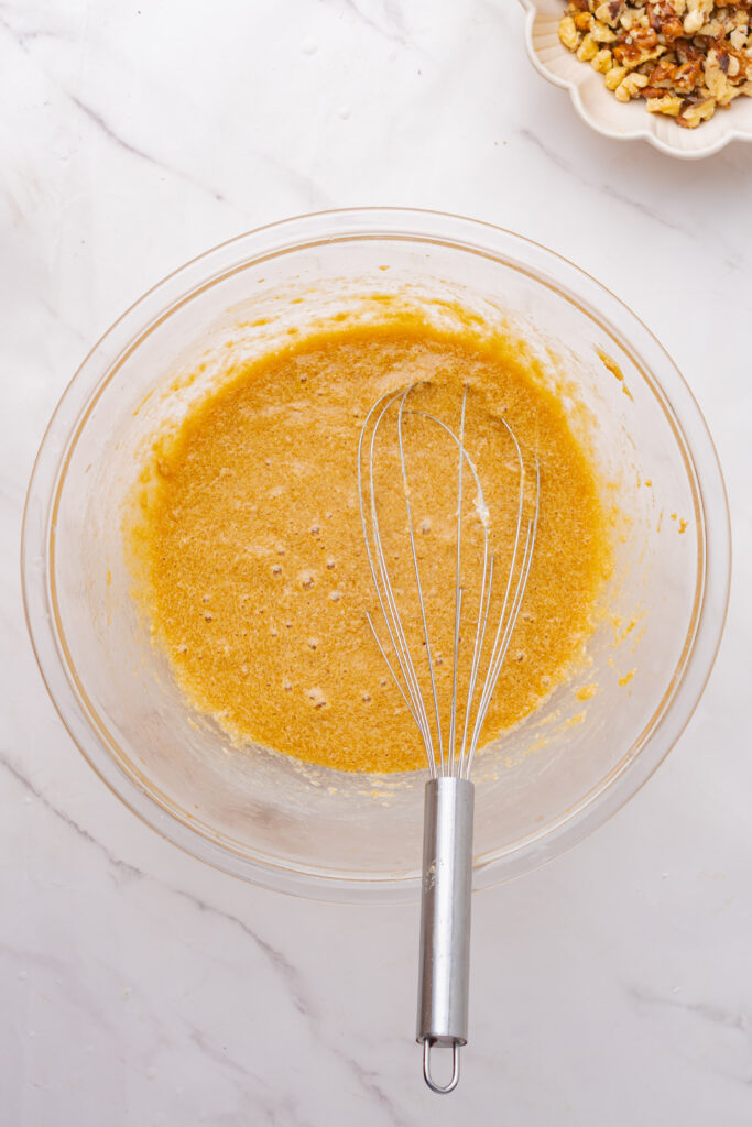 Wet ingredients for maple cinnamon coffee cake.