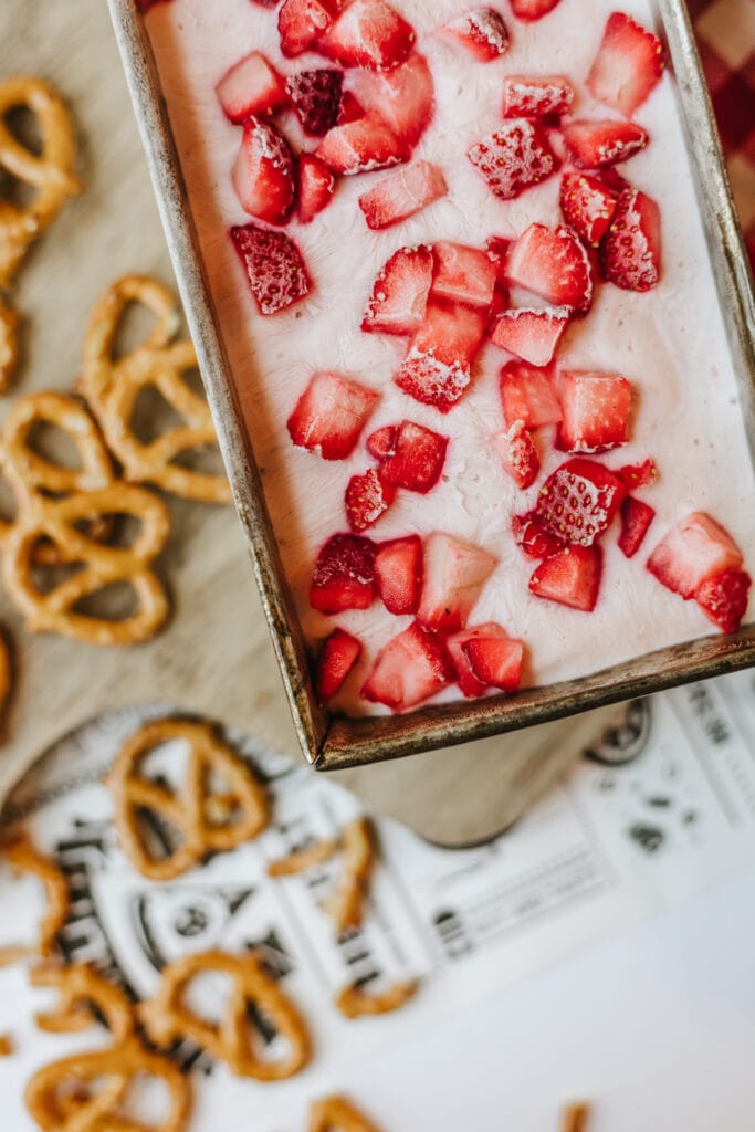Frozen homemade ice cream with cottage cheese and strawberries.
