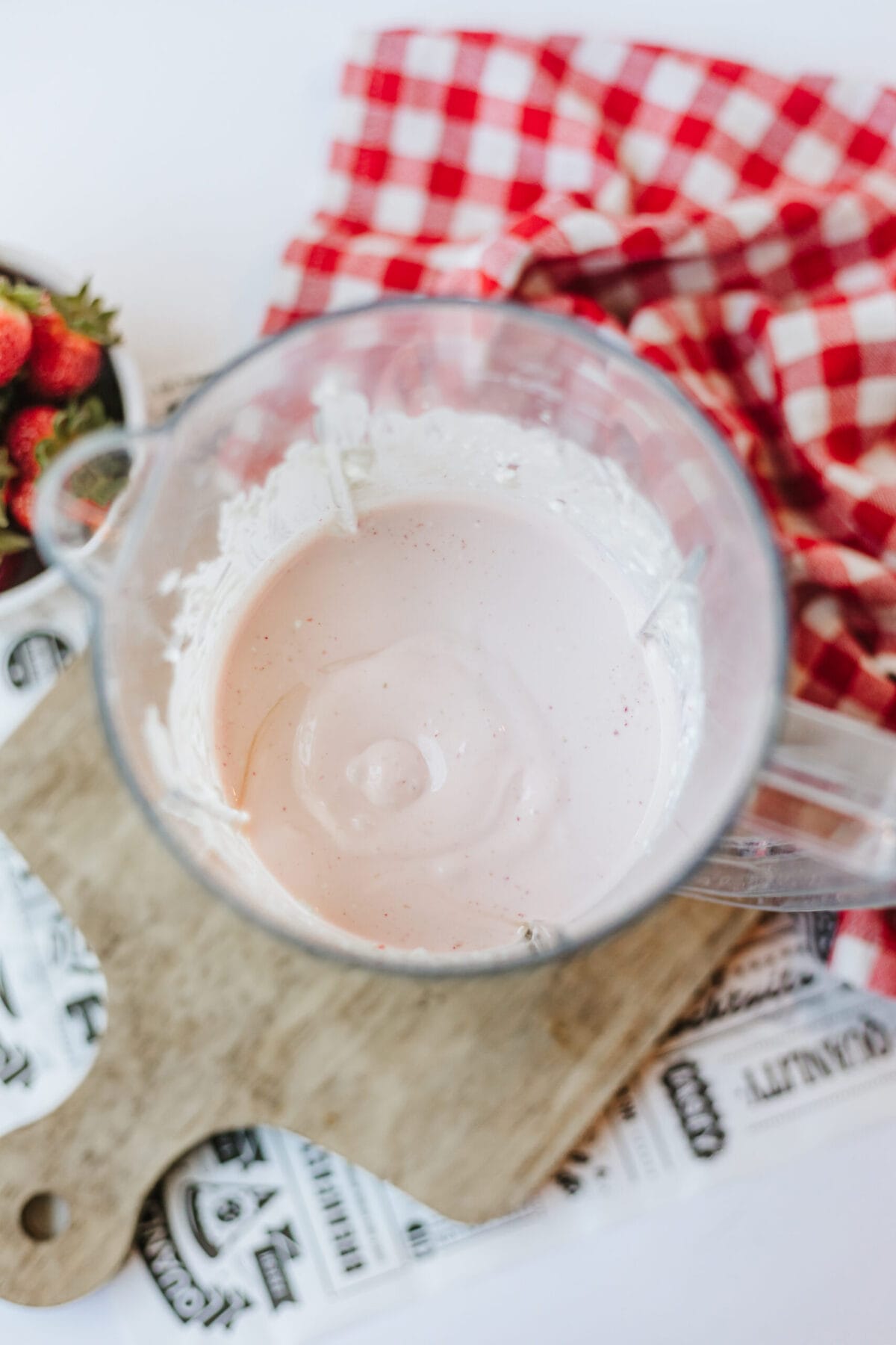 Fresh strawberries, cottage cheese, honey, and vanilla blended together to make a frozen summer dessert.