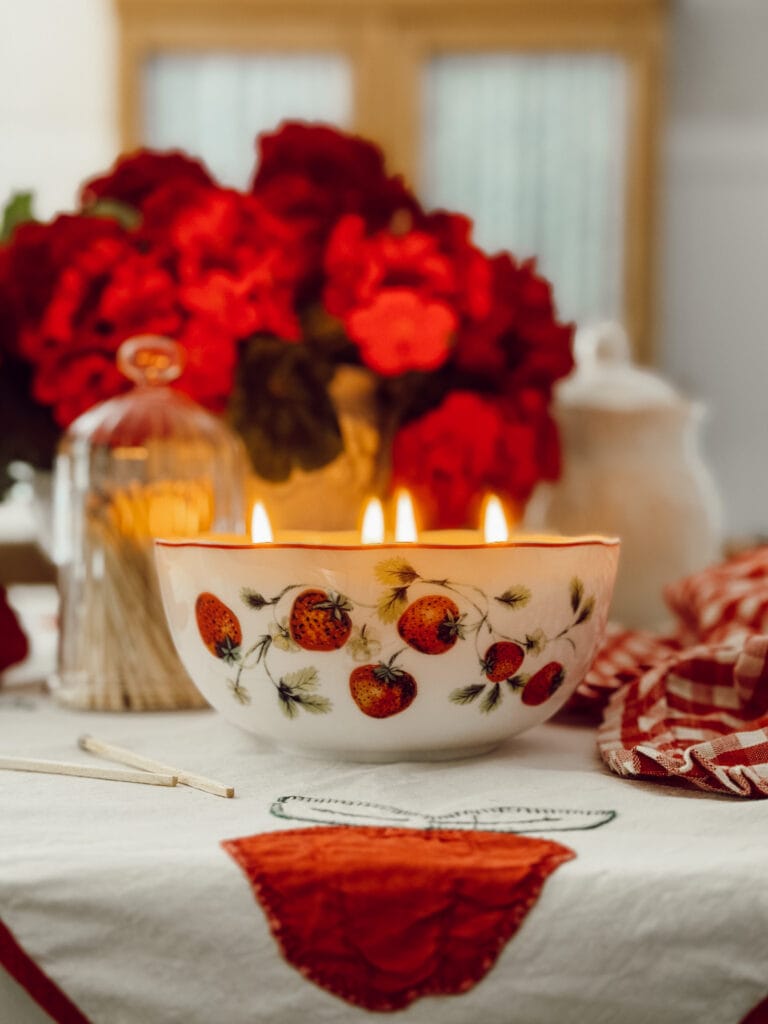 Weekly Wednesday Wish List #262 Eleanor Rose Home strawberry candle on kitchen countertop.