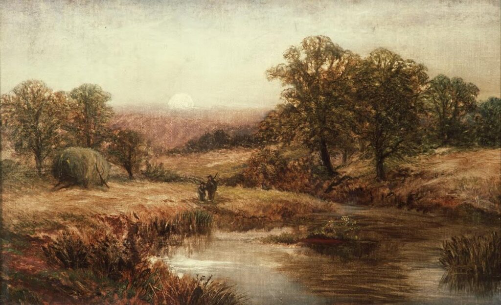 Harvest moon in country landscape with deep autumn colors.