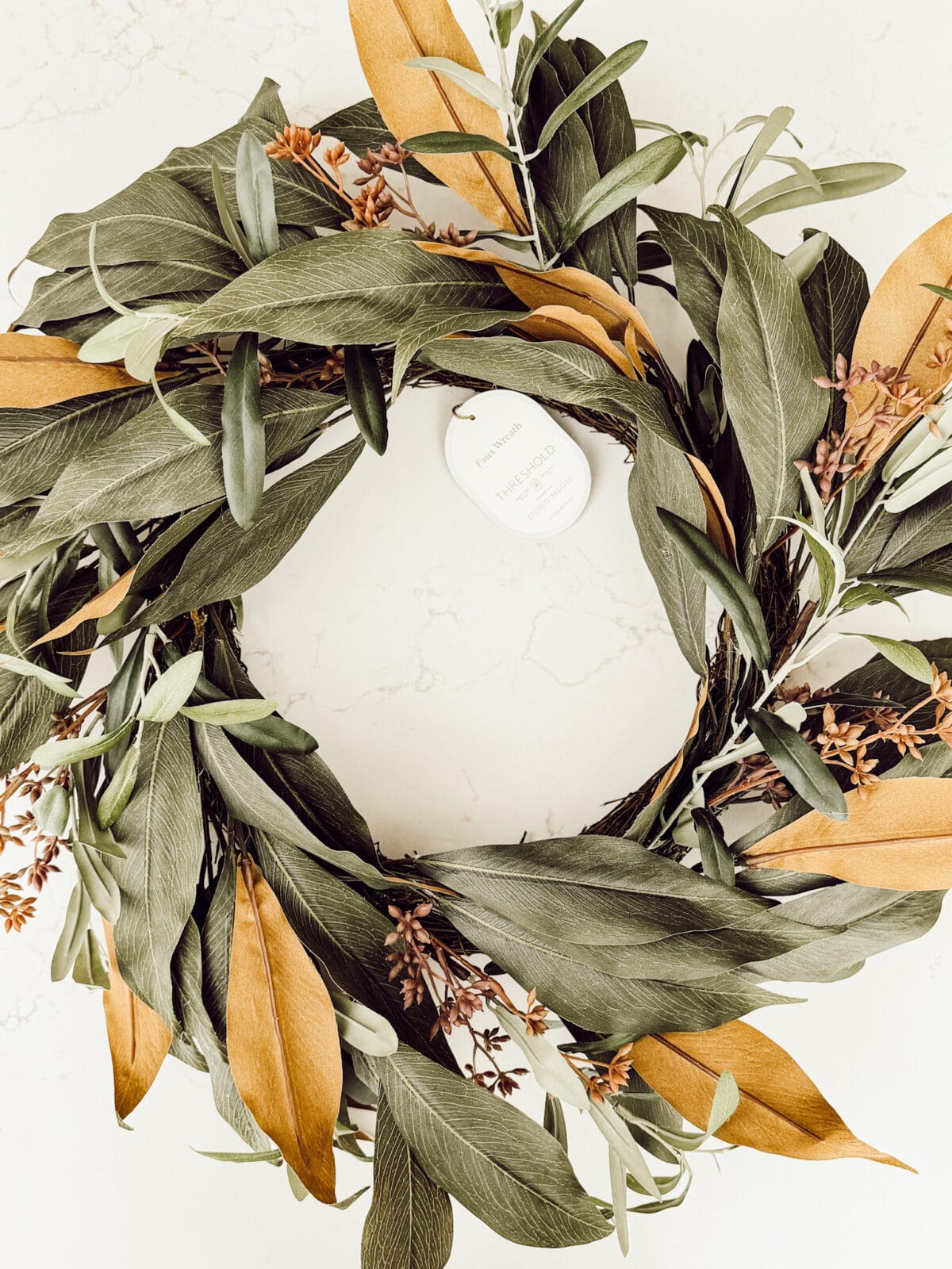 A store-bought fall wreath for a simple DIY for autumn decorating.