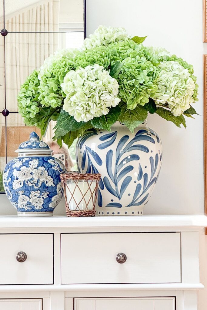 Weekly Wednesday Wish List #266 StoneGable entryway console table with a vase of hydrangeas.