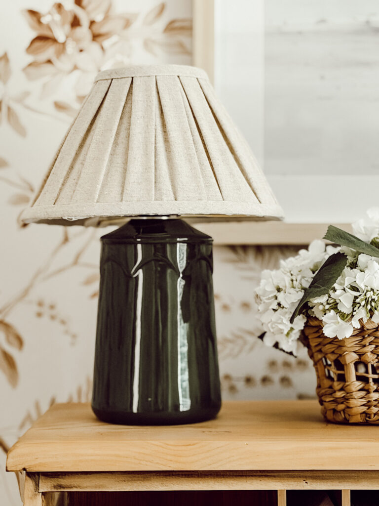 Weekly Wednesday Wish List #268 Eleanor Rose Home office with wooden desk with a green ceramic lamp on top.
