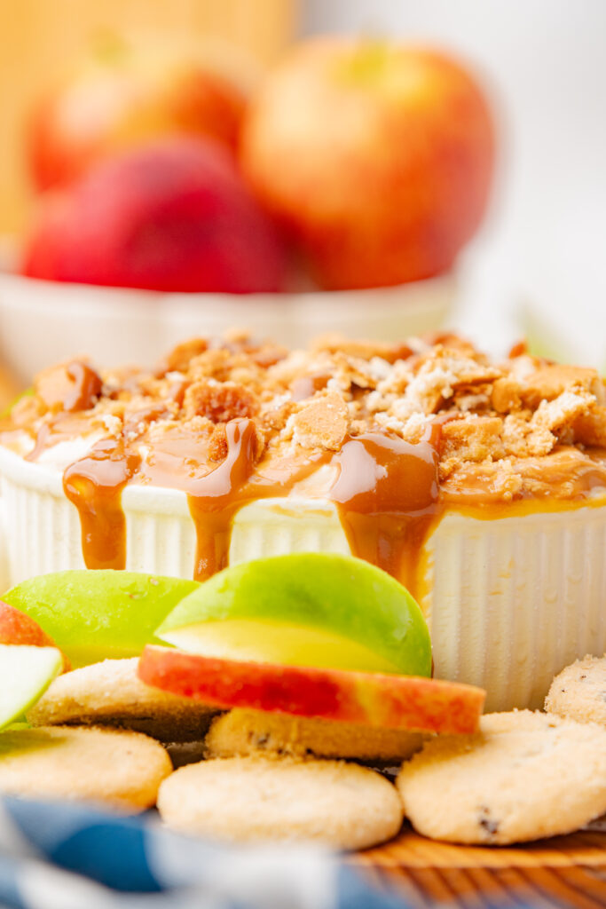 Cheesecake caramel apple dip with fresh crisp apples and vanilla wafers.