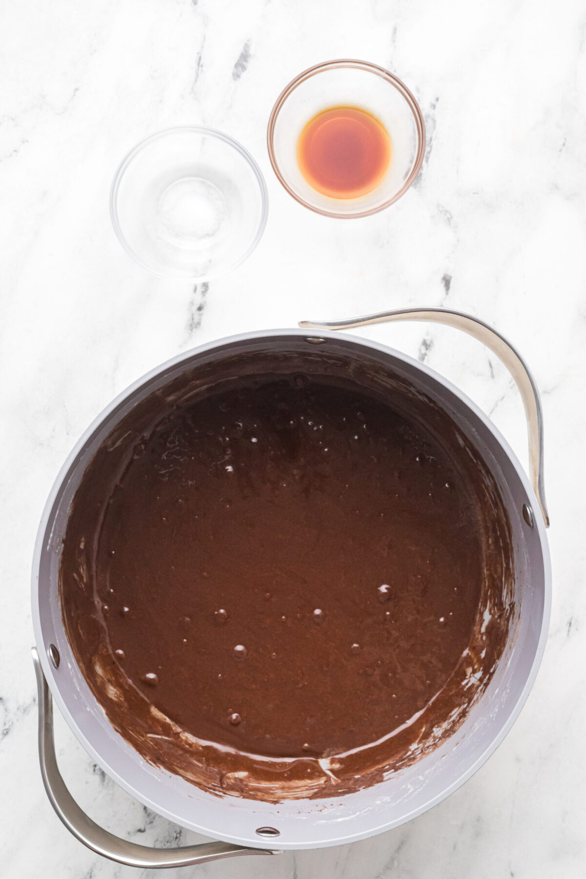 Hot cocoa mix added to the melted marshmallow mixture.