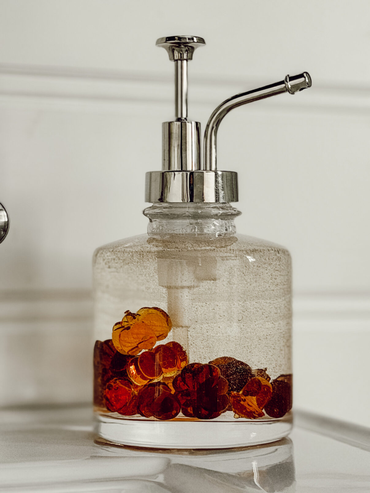 Fall soap pump on bathroom counter for the autumn season.