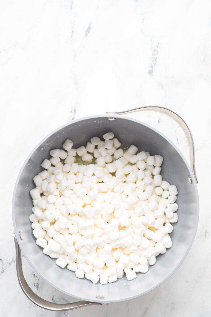Mini marshmallows added to the melted butter in a larget pot.