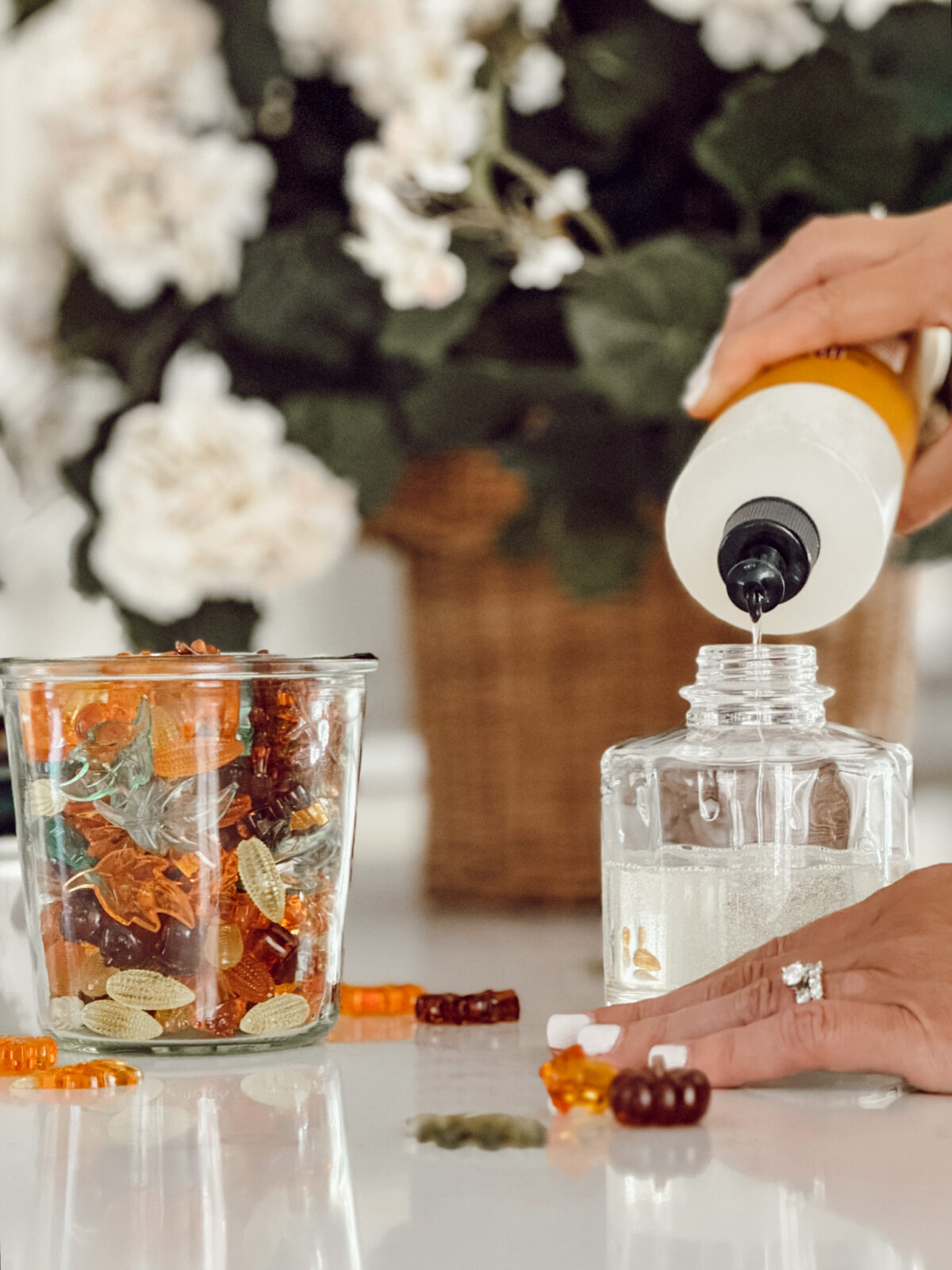 Pour the liquid dish soap into the soap pump to begin the fall DIY.