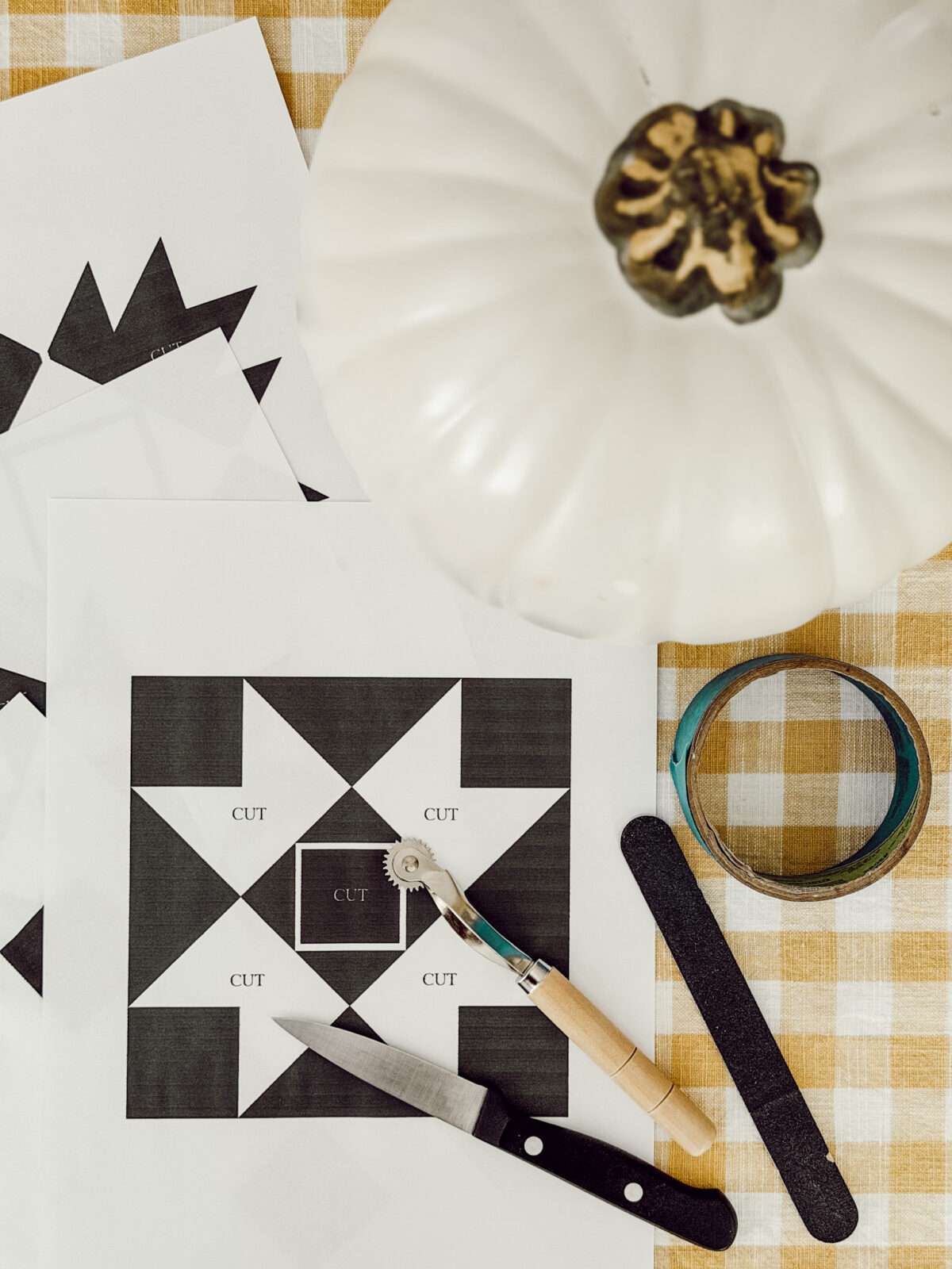 All the supplies you'll need to carve a quilt design into a faux pumpkin.