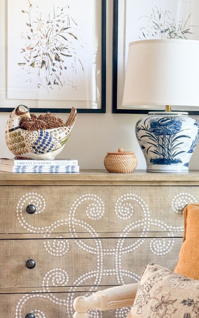Weekly Wednesday Wish List #273 living room with dresser with lamp and bird planter.