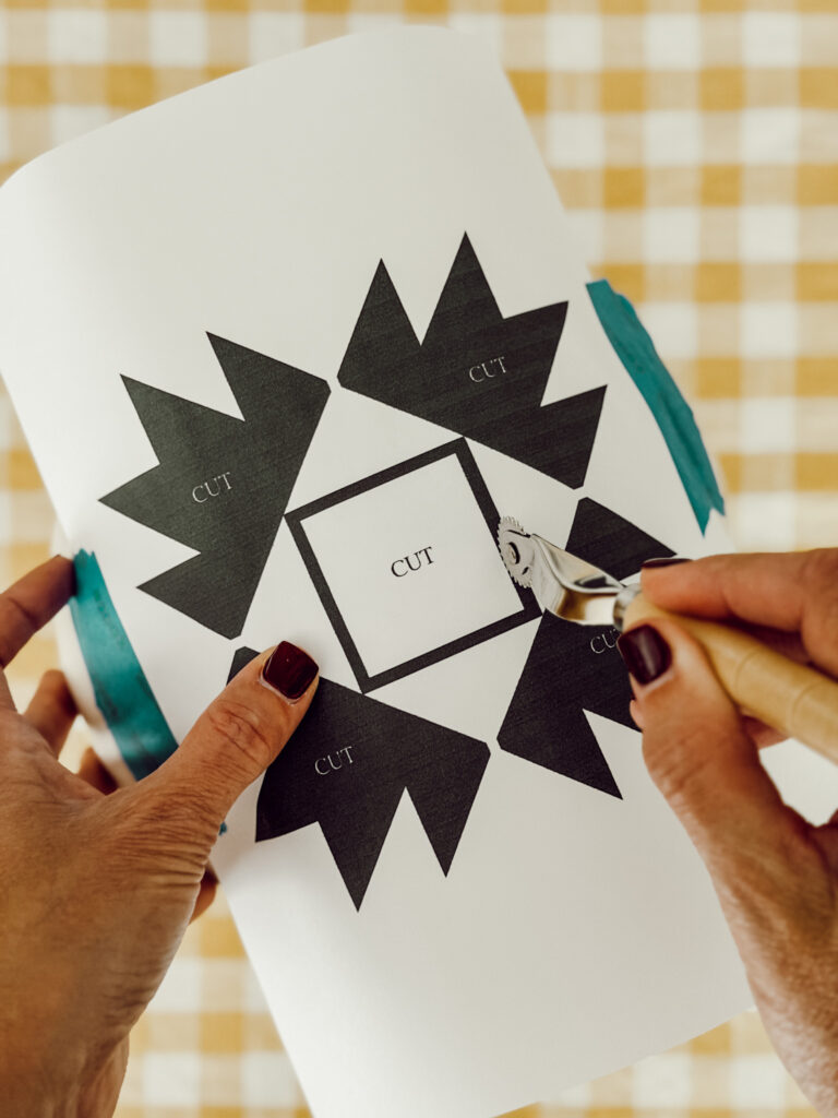 Transfer the quilt pattern onto the pumpkin with a sewing tracing wheel.
