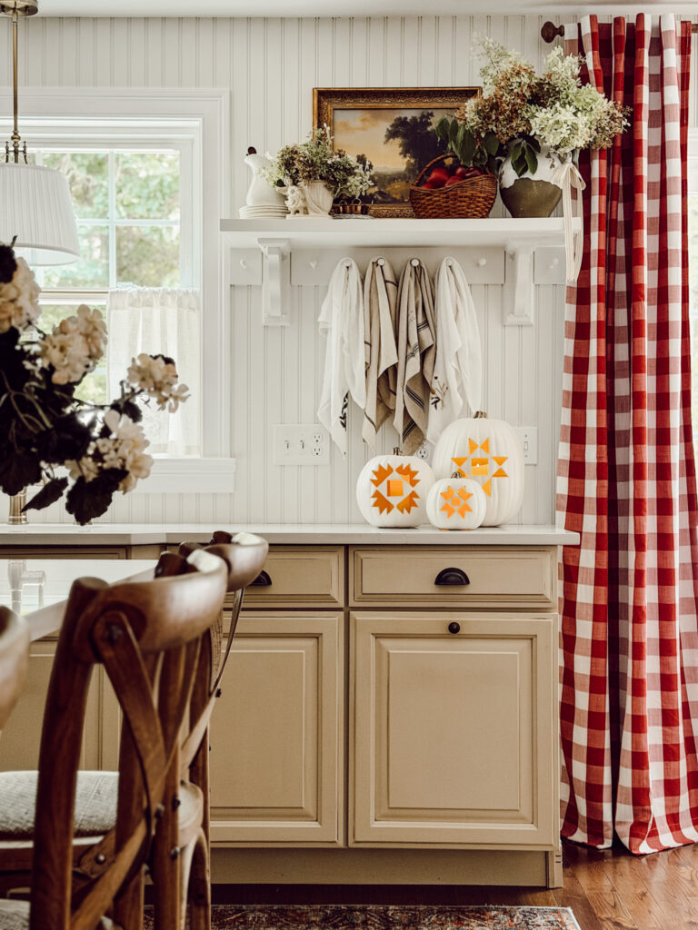 Weekly Wednesday Wish List #273 Eleanor Rose Home country cottage kitchen with red buffalo check curtains and fall decorations.